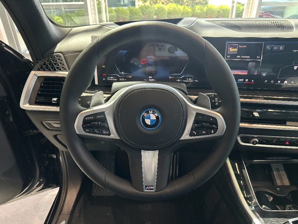 New 2026 Black Sapphire Metallic BMW xDrive50e image 9
