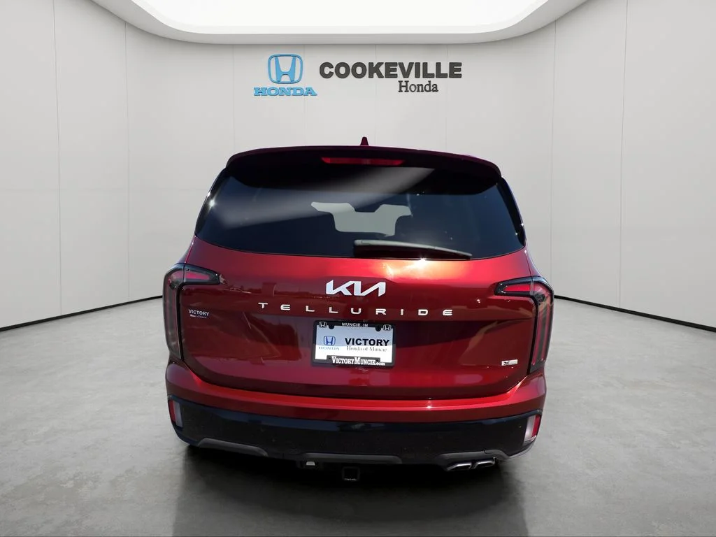 Used 2024 Dawning Red Kia EX X-Line image 6