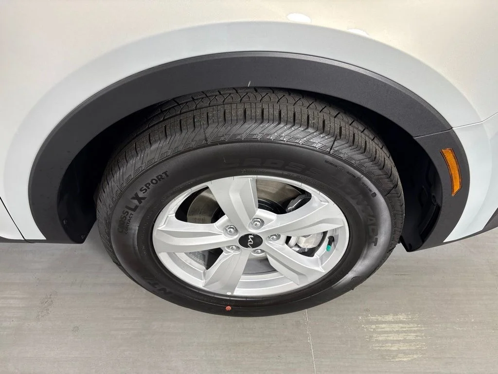New 2026 Ivory Silver Kia LX image 11