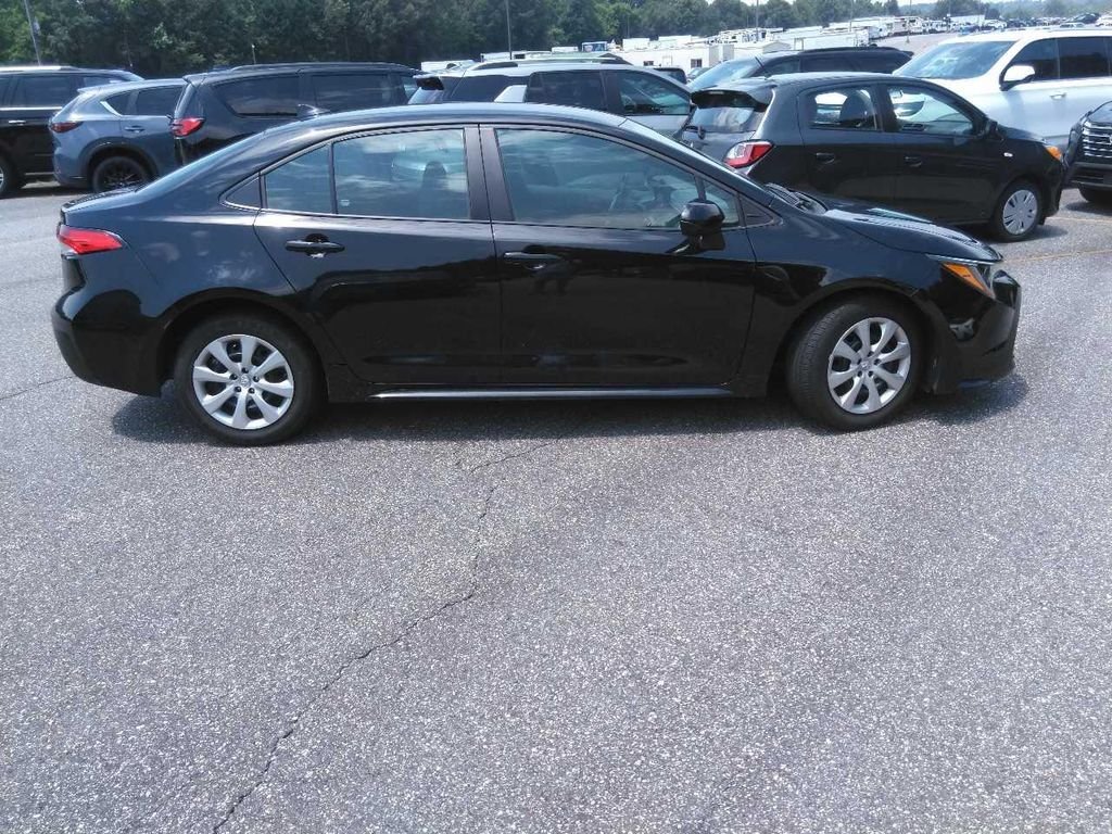 Used 2024 Black Toyota LE image 1