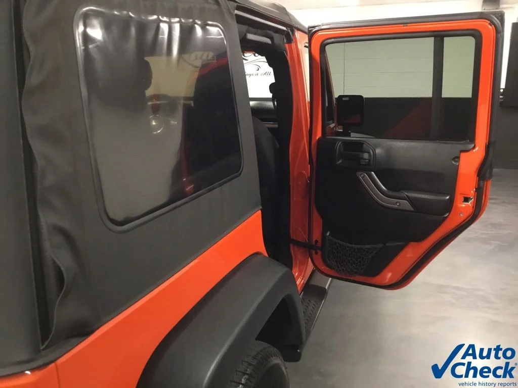 Used 2015 Orange Jeep Unlimited Sport image 36