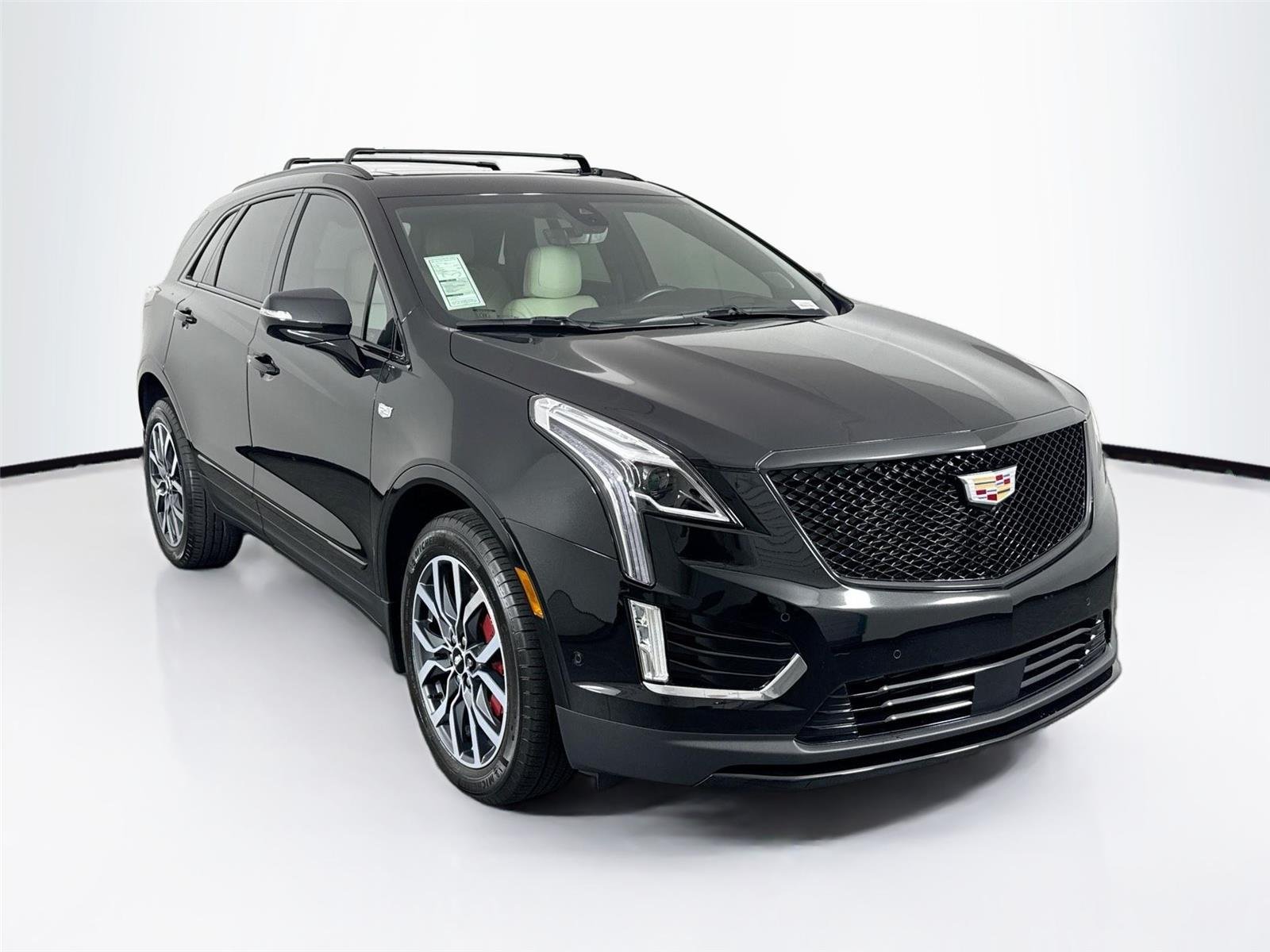 Used 2024 Stellar Black Metallic Cadillac AWD Sport image 10