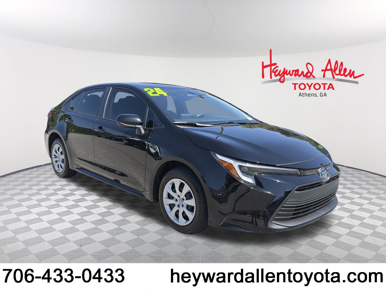 Used 2024 Midnight Black Metallic Toyota LE image 1