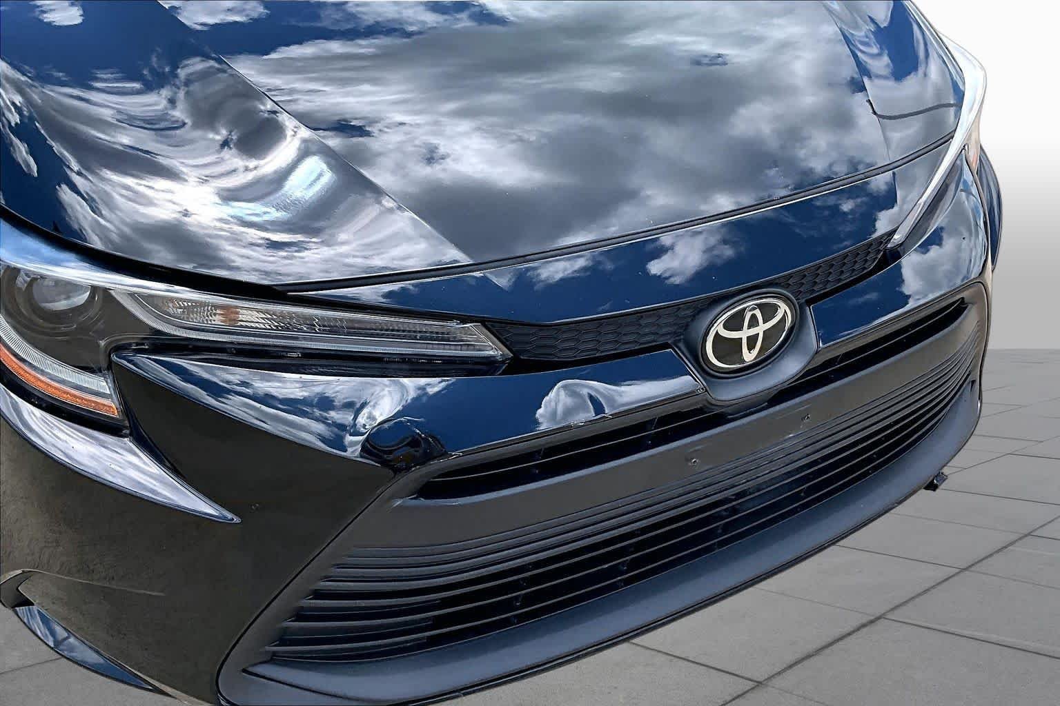 Used 2024 Midnight Black Metallic Toyota LE image 28
