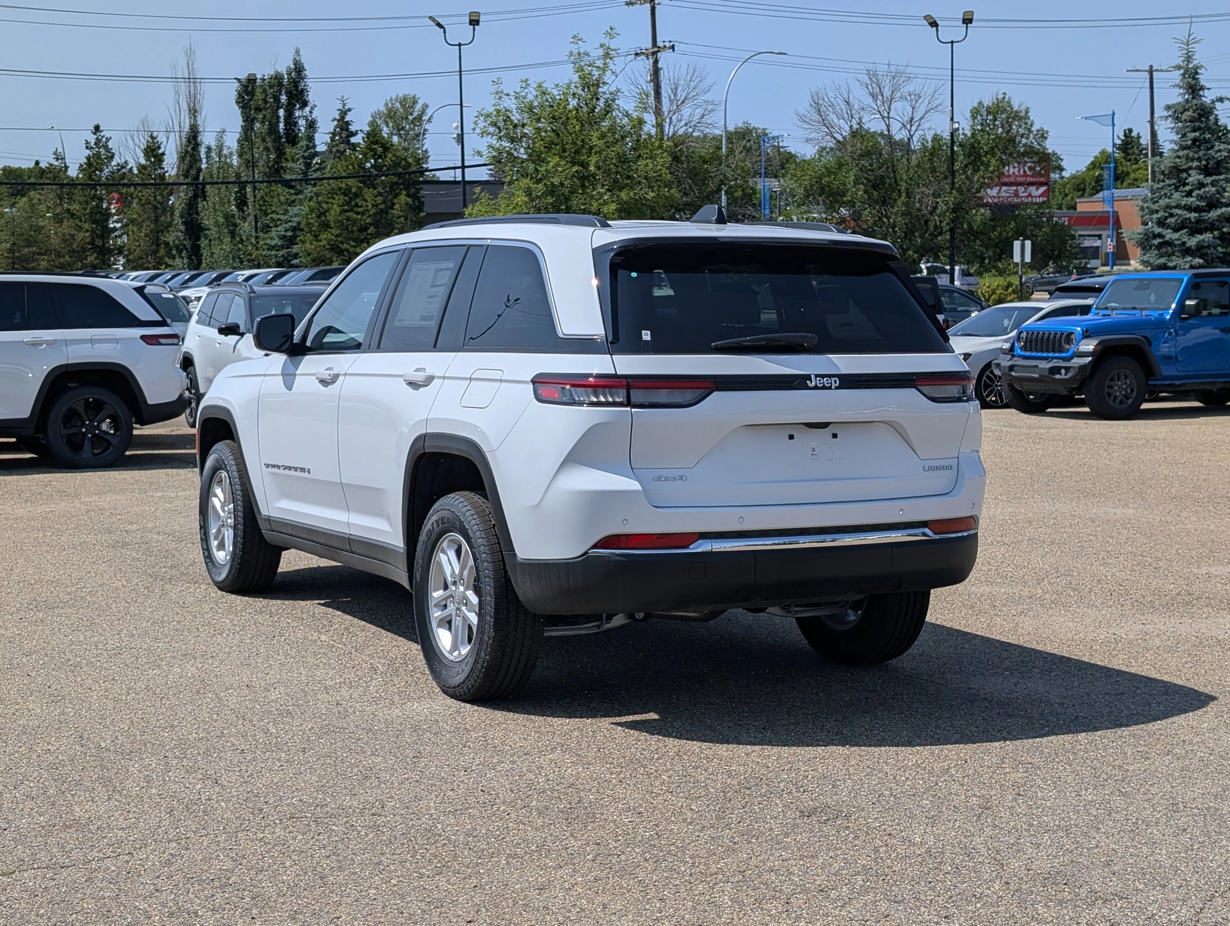 New 2025 Bright White Jeep Laredo image 4