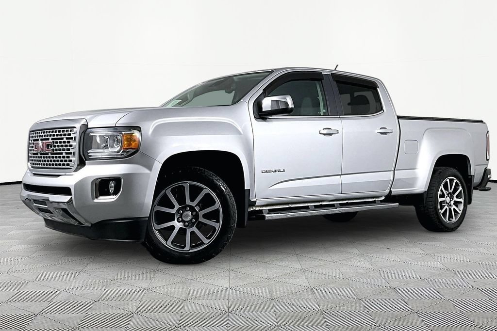 Used 2017 QUICKSILVER METALLIC GMC 4WD Denali image 1