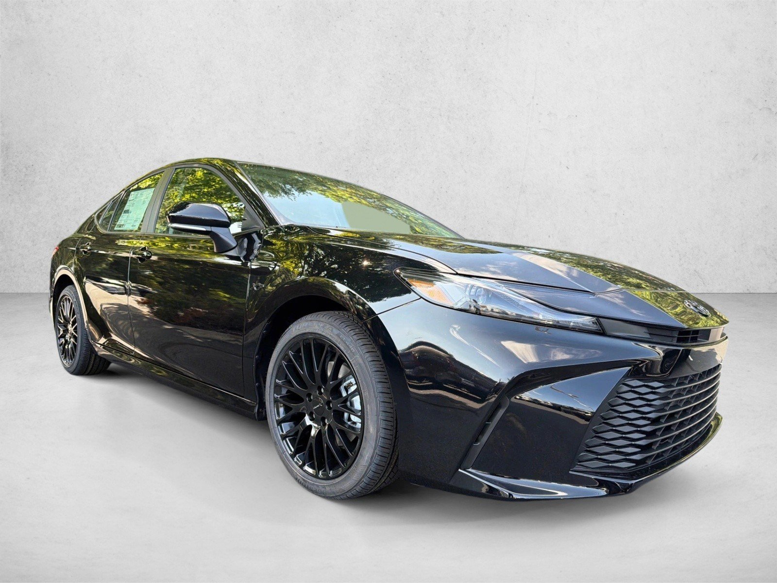 Used 2026 Midnight Black Toyota LE image 1