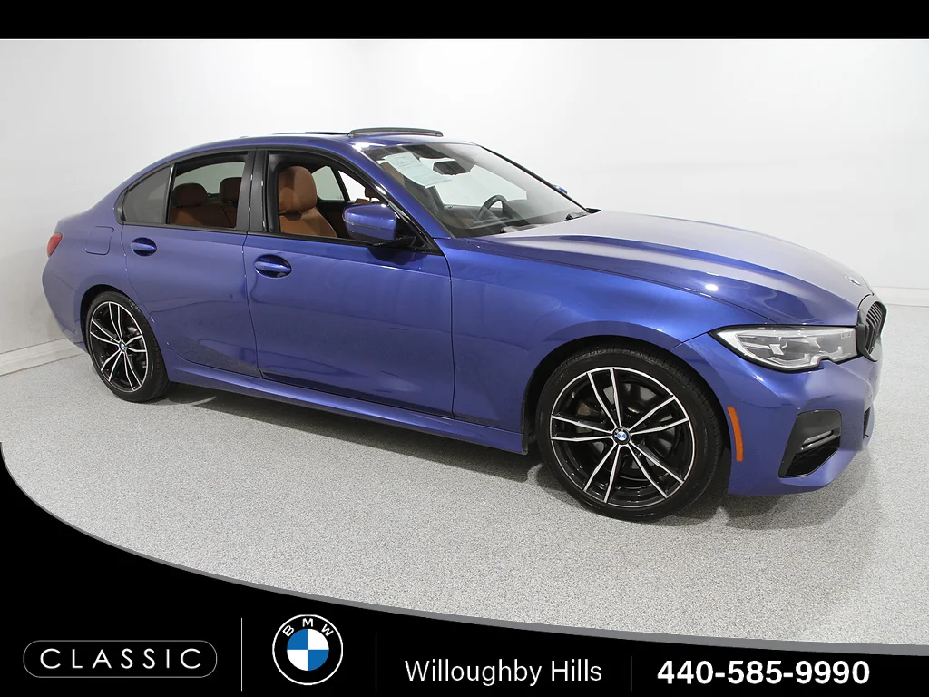 Used 2020 Portimao Blue Metallic BMW 330i xDrive image 1