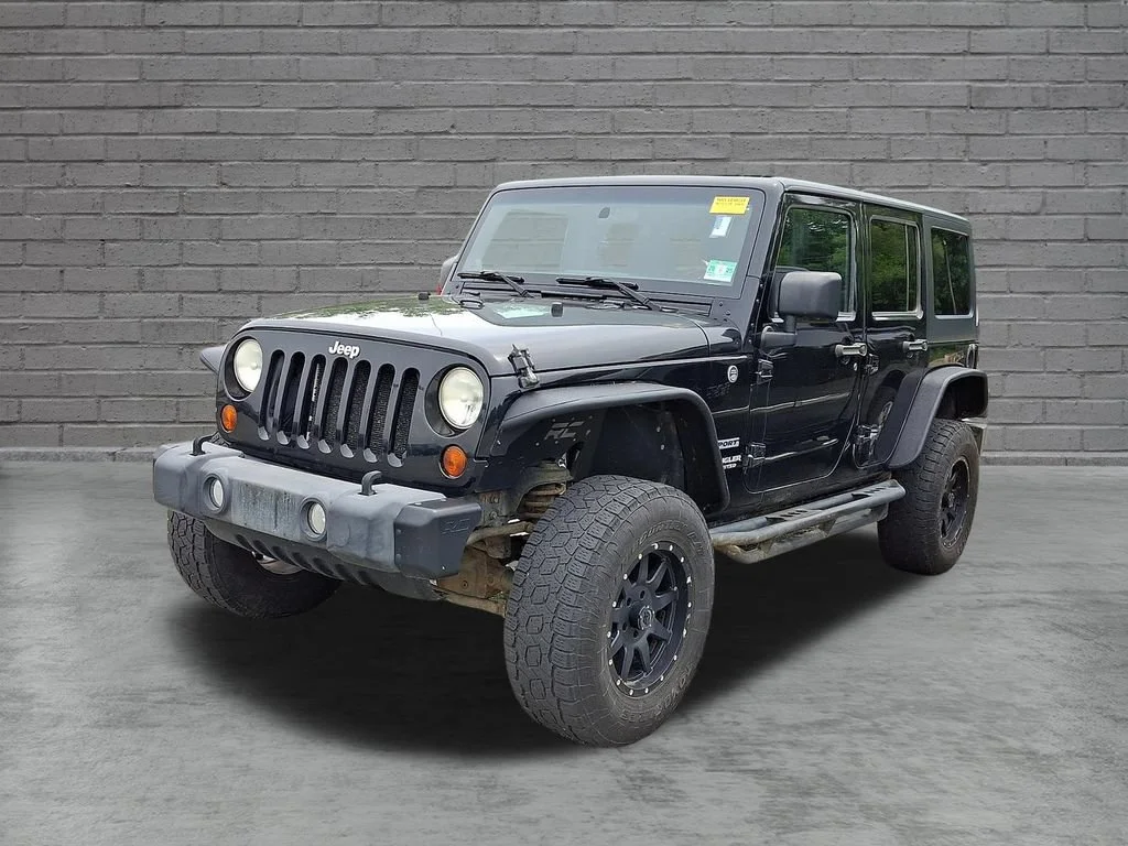 Used 2012 Black Jeep Sport image 4