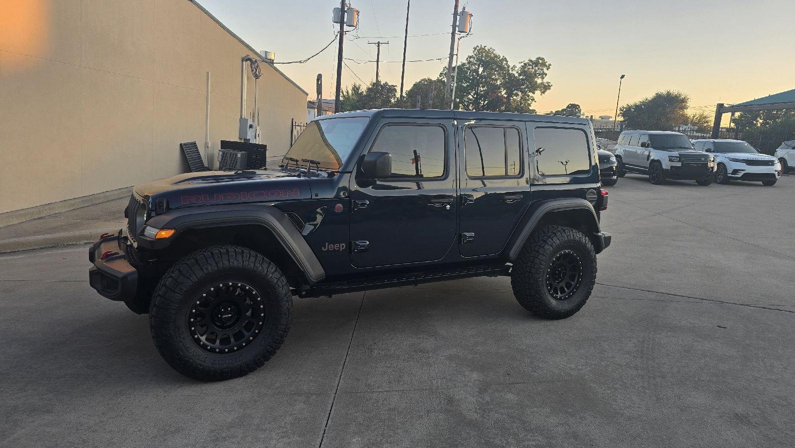 Used 2025 Fathom Blue Pearl Jeep Rubicon image 1
