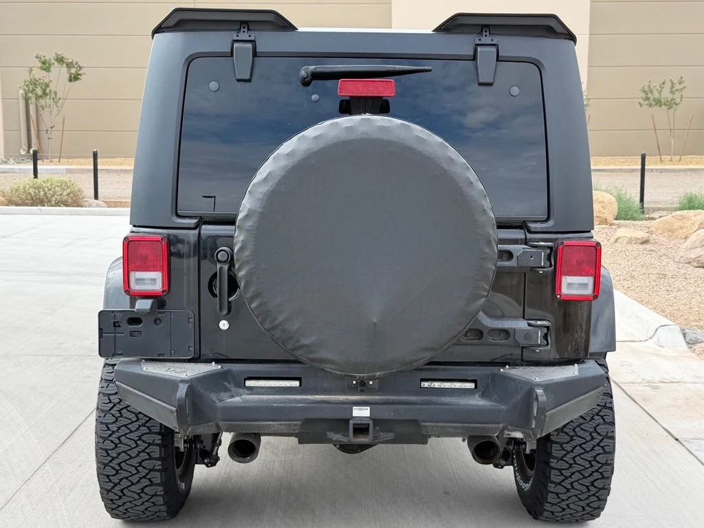 Used 2018 Black Jeep Unlimited Sahara image 6