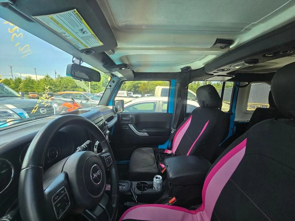 Used 2017 Blue Jeep Unlimited Sahara image 4