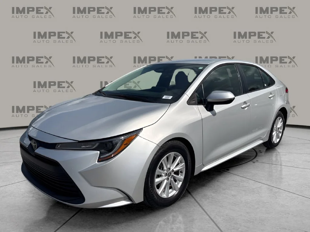 Used 2024 Silver Toyota LE image 1