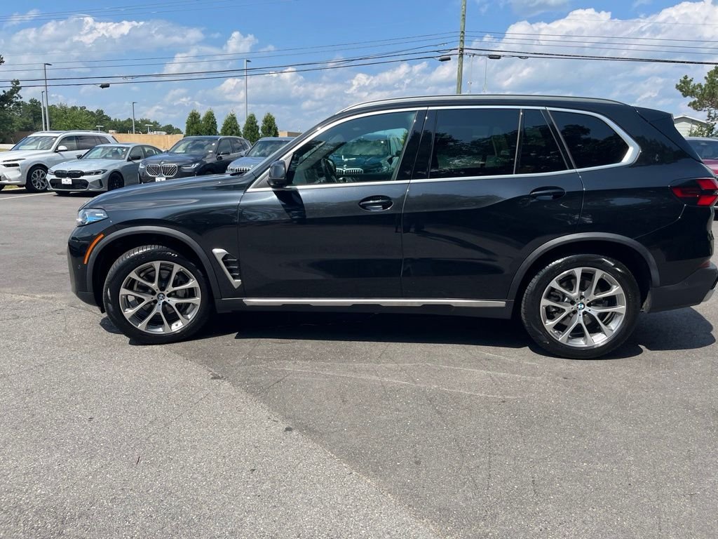 Certified Used 2024 Black Sapphire Metallic BMW xDrive40i image 4
