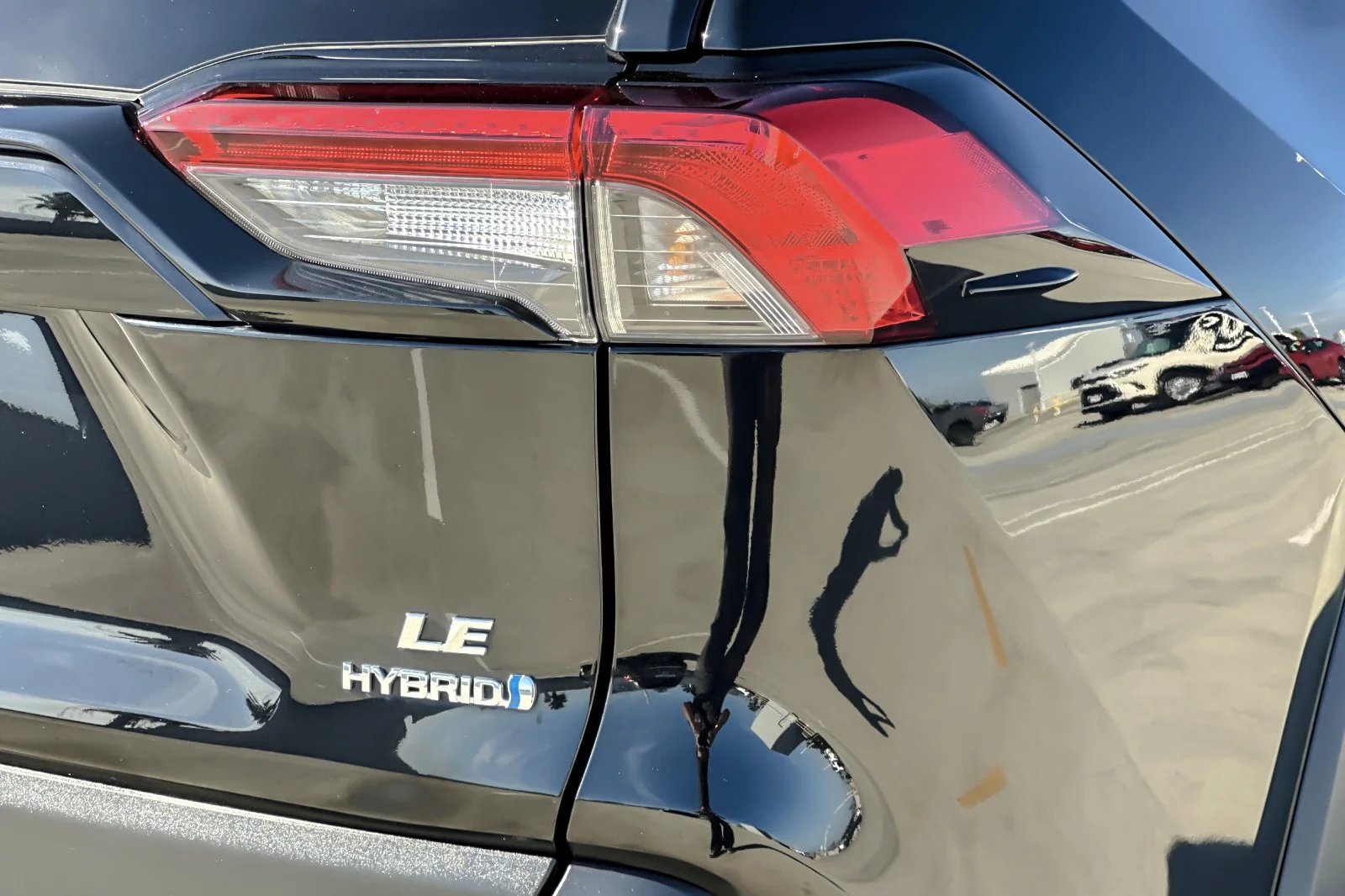 Used 2024 Midnight Black Metallic Toyota Hybrid LE image 25