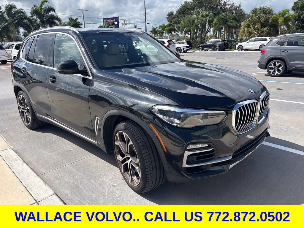 Used 2021 Black BMW sDrive40i image 1