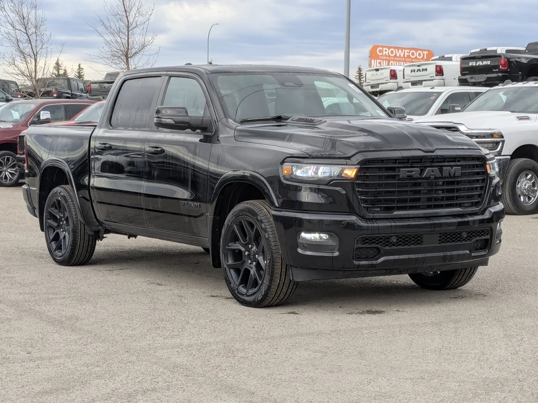 New 2026 Black RAM Laramie - - Twin Turbo - 22 Black Wheels - 14.4 Screen - Harman/Kardon - Pano Sunroof & More! image 2
