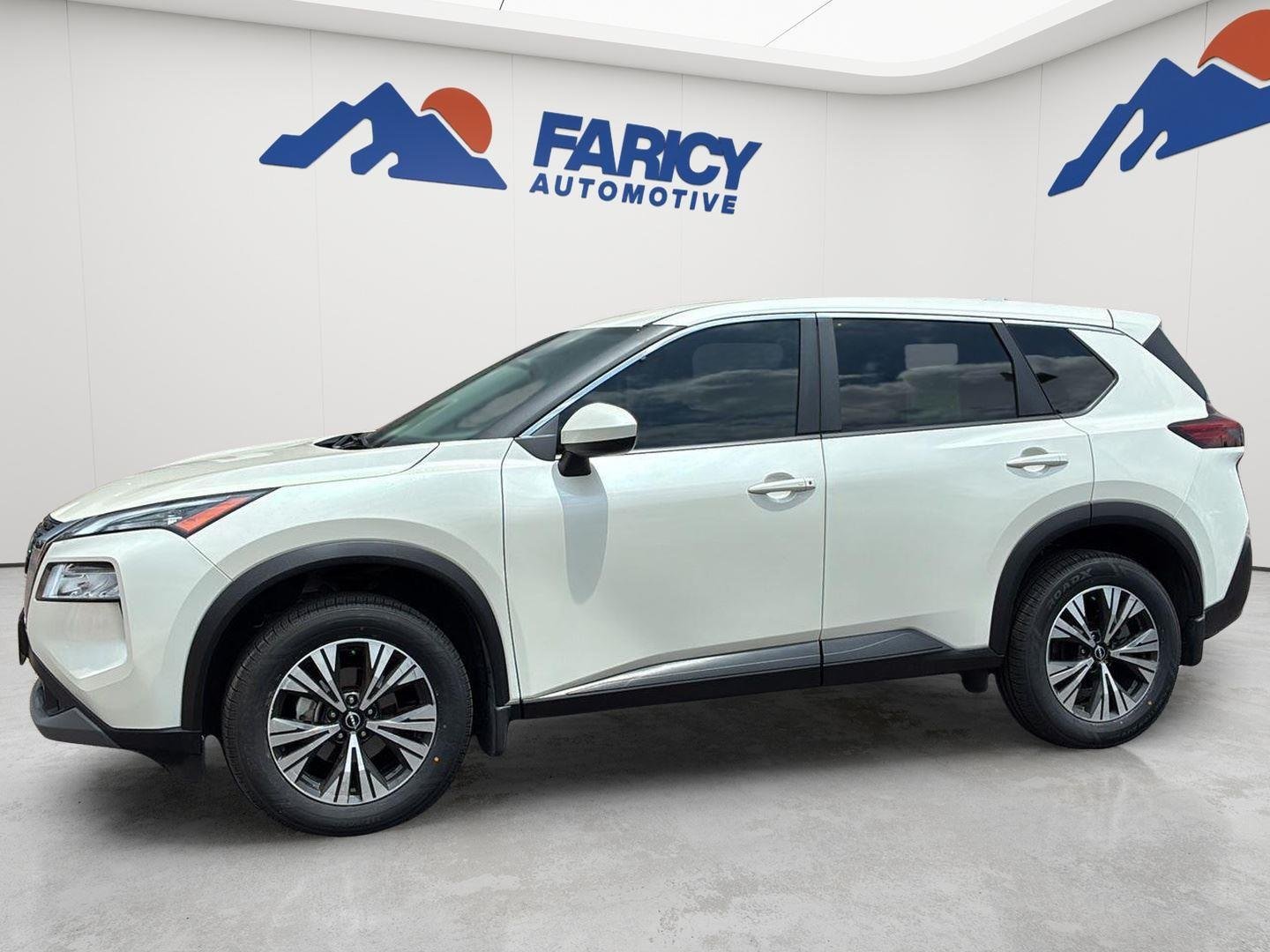 Used 2023 Pearl White Tricoat Nissan SV image 1
