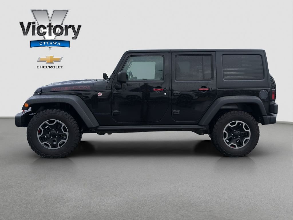 Used 2016 Jeep Wrangler Unlimited Rubicon Hard Rock with VIN 1C4HJWFG8GL122928 for sale in Kansas City