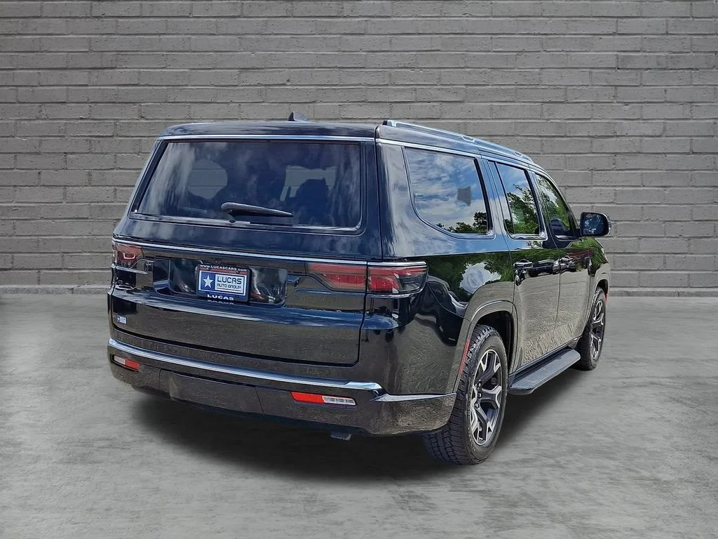 Used 2023 Diamond Black Crystal Pearlcoat Jeep Series III image 11