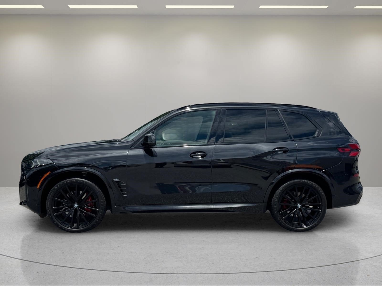 Used 2024 Black Sapphire Metallic BMW sDrive40i image 2