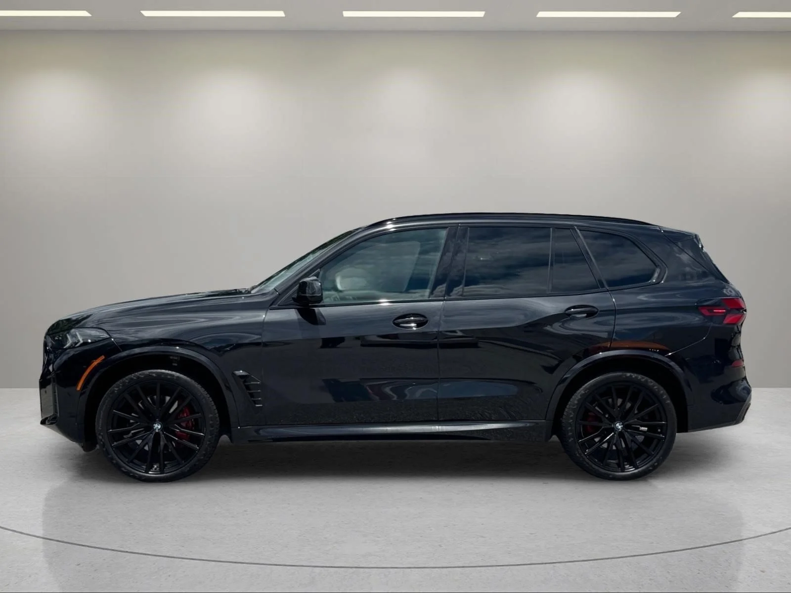 Used 2024 Black Sapphire Metallic BMW sDrive40i image 2