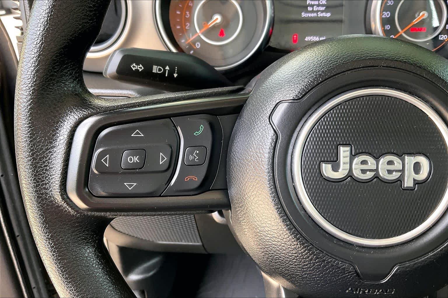 Used 2023 Granite Crystal Metallic Clearcoat Jeep Sport image 20