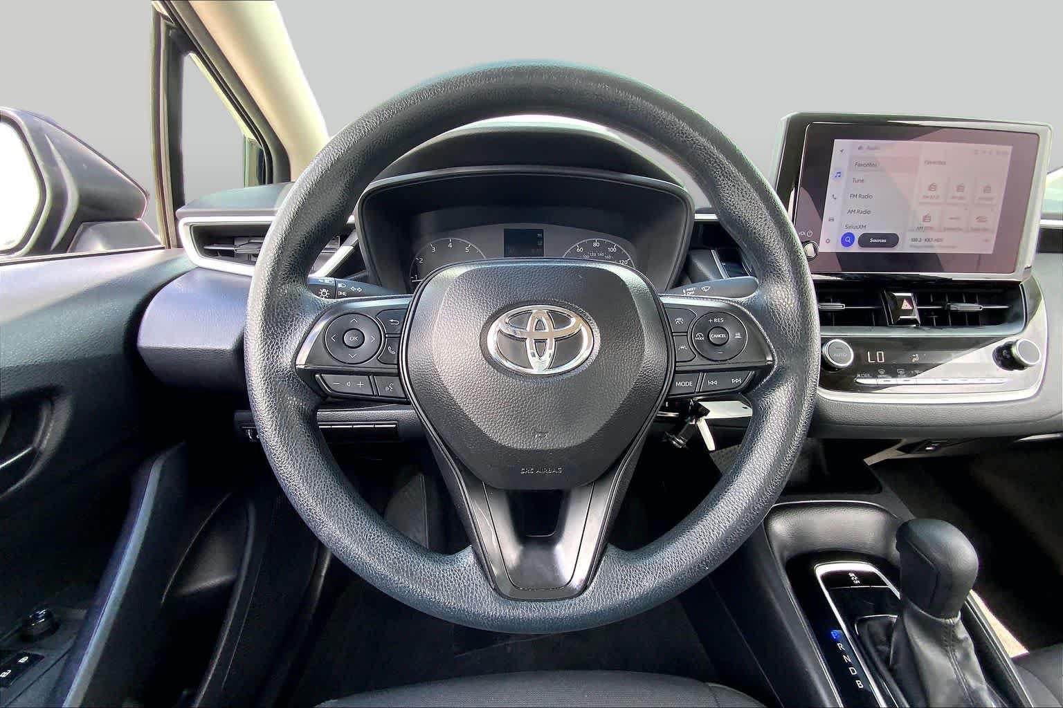 Used 2024 Midnight Black Metallic Toyota LE image 6