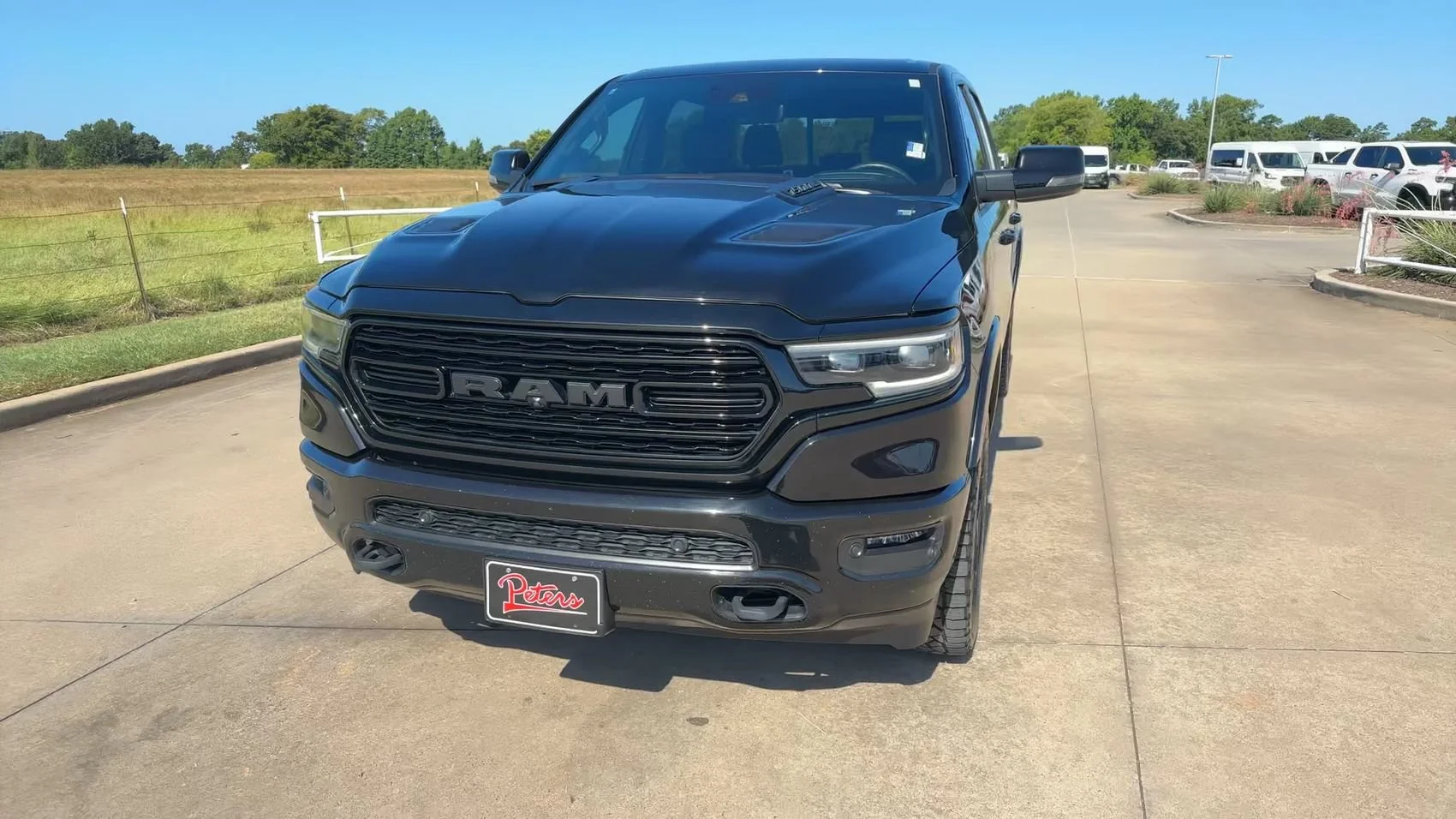 Used 2023 Diamond Black Crystal Pearlcoat Ram Limited image 4