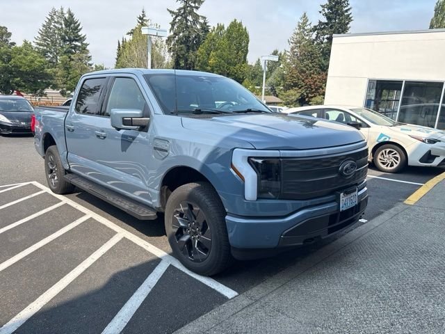 Used 2023 Ford F-150 Lightning Lariat with VIN 1FTVW1EVXPWG46748 for sale in Kirkland, WA