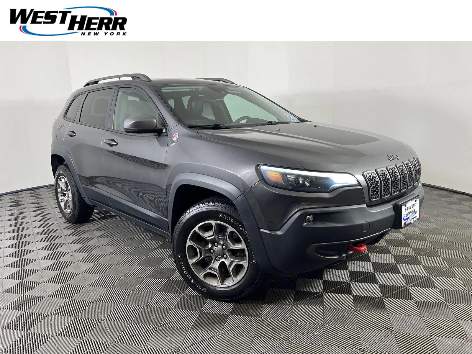 Used 2021 Granite Crystal Metallic Clearcoat Jeep Trailhawk image 1