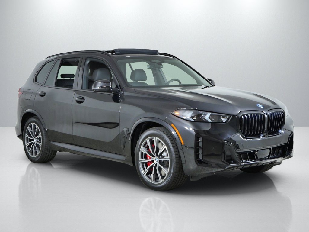 New 2026 Black Sapphire Metallic BMW xDrive50e image 7