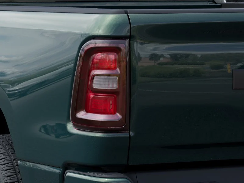 New 2026 Serrano Green Metallic RAM Express Quad Cab 4x4 6