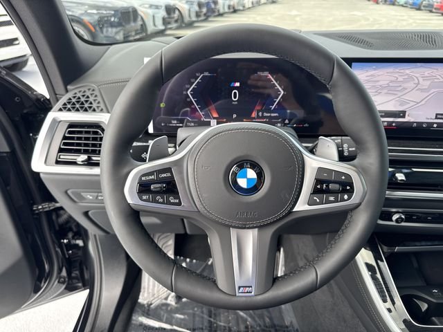 New 2026 Black Sapphire Metallic BMW xDrive40i image 16