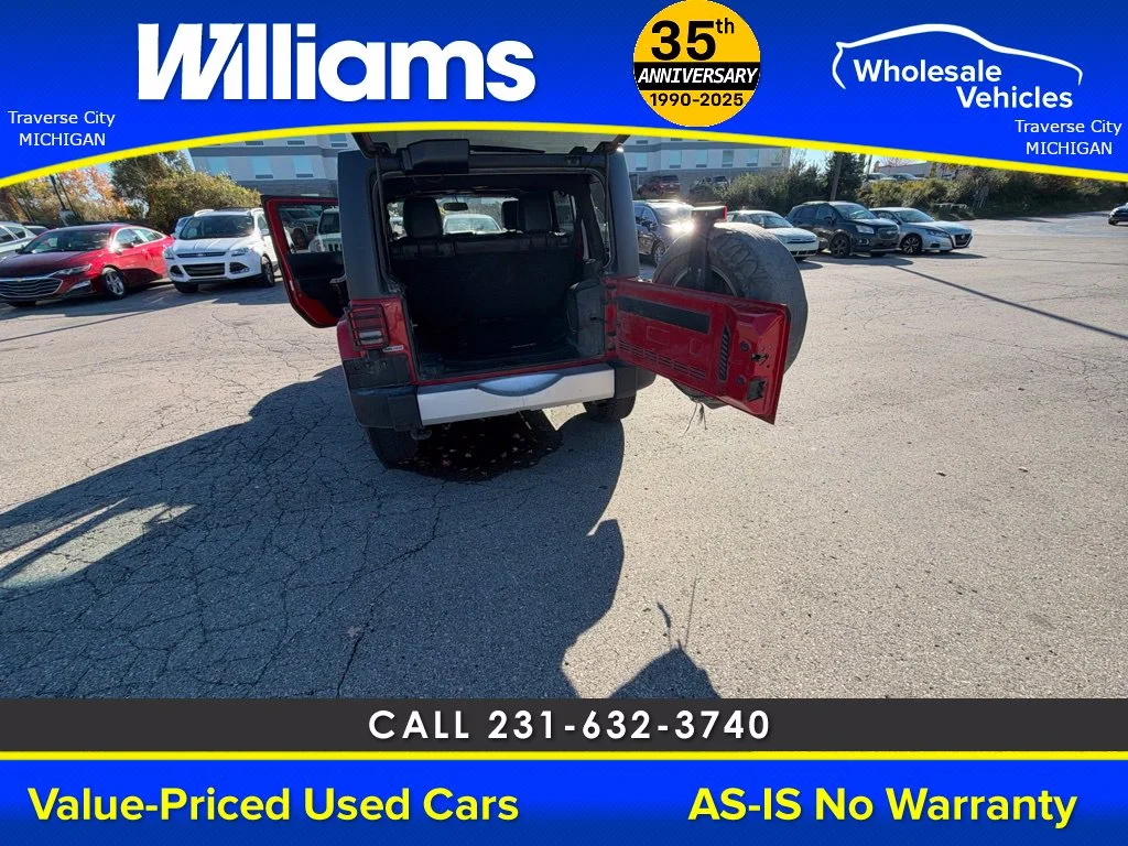Used 2013 Flame Red Jeep Unlimited Sahara image 37