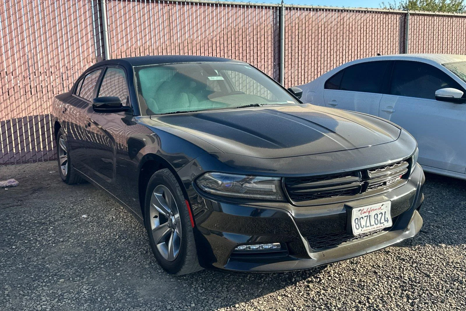 Used 2016 Pitch Black Clearcoat Dodge SXT image 2