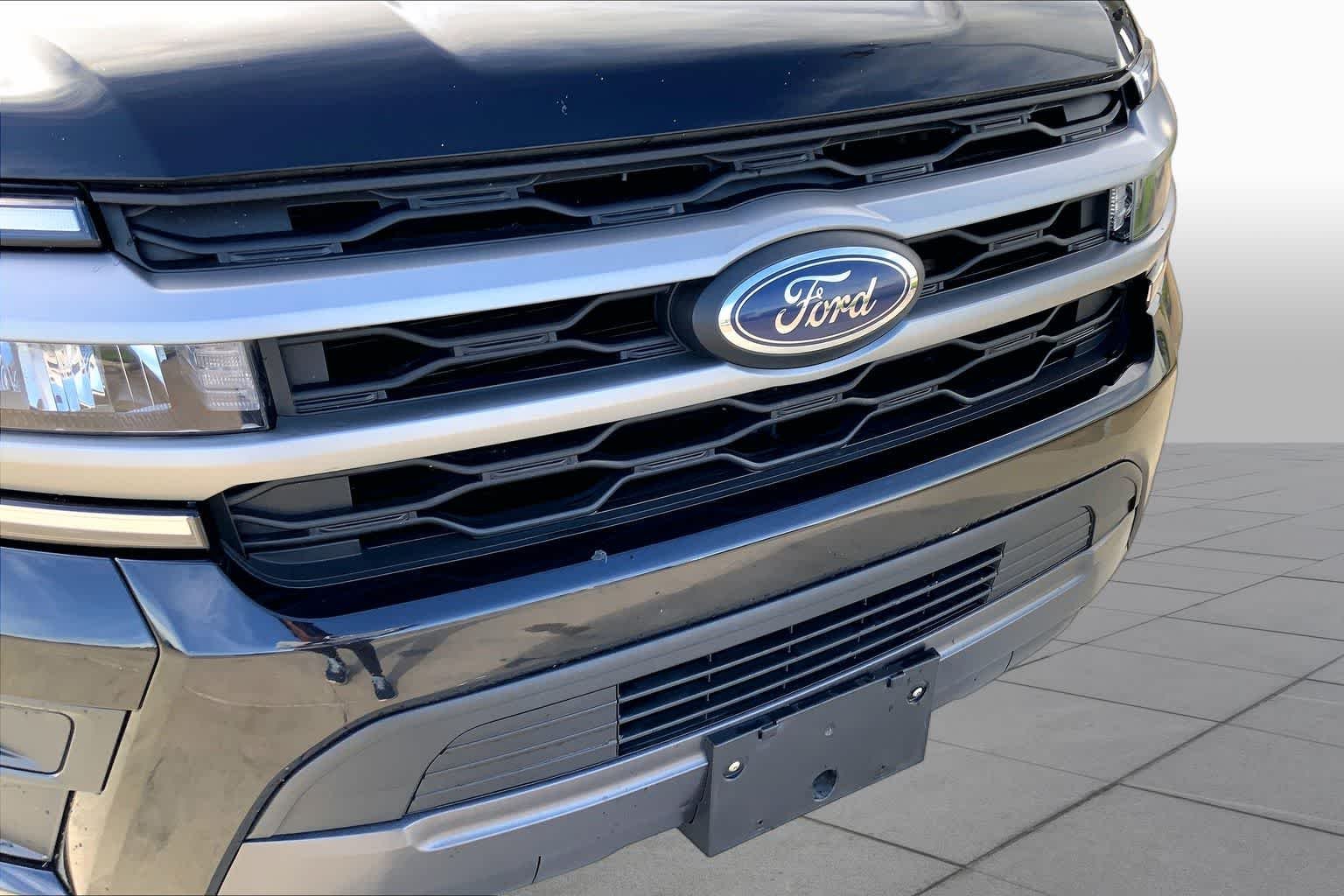 Certified Used 2024 Agate Black Metallic Ford XLT image 29