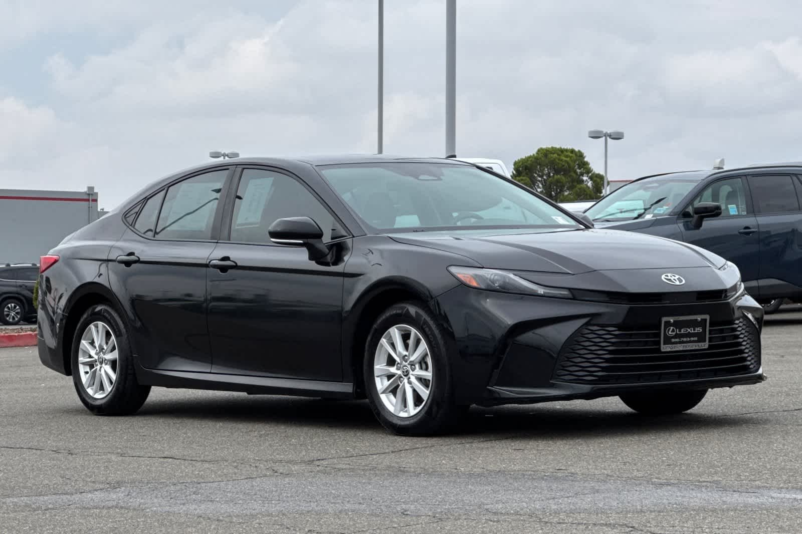 Used 2025 Midnight Black Metallic Toyota LE image 5