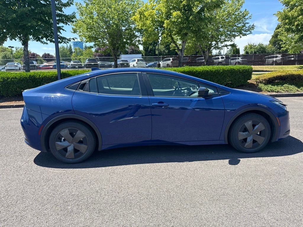 Used 2025 Reservoir Blue Toyota LE image 8