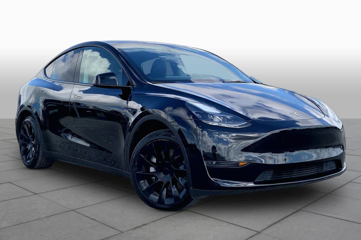 Used 2024 Solid Black Tesla  image 2