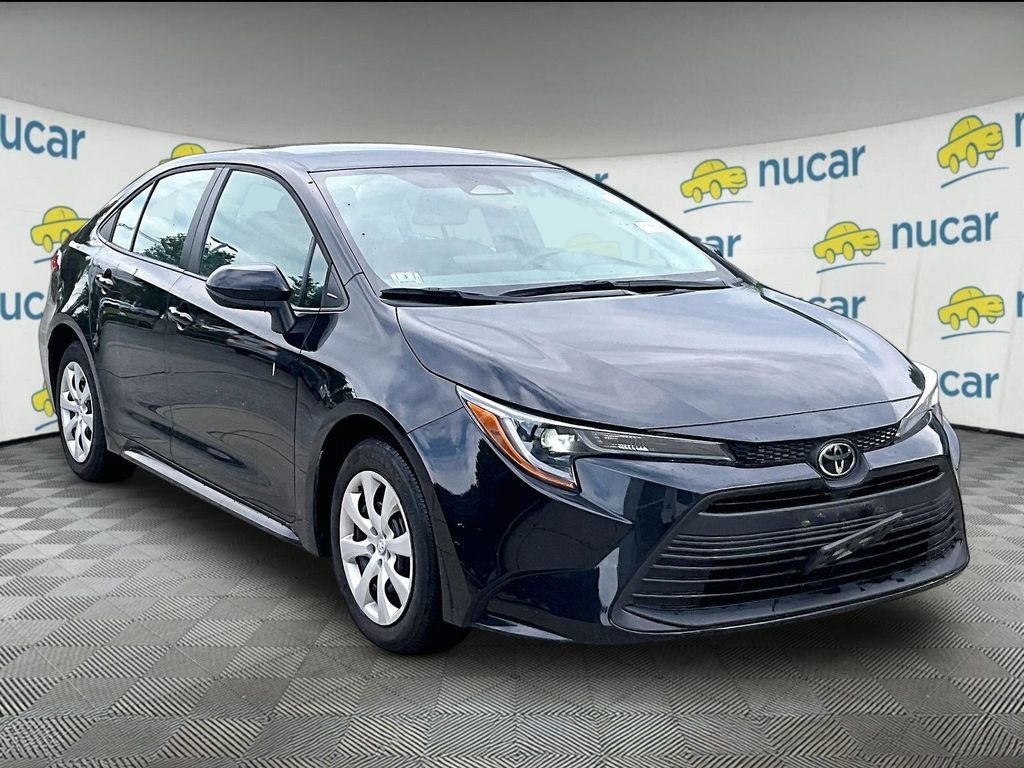 Used 2023 Black Toyota LE image 1