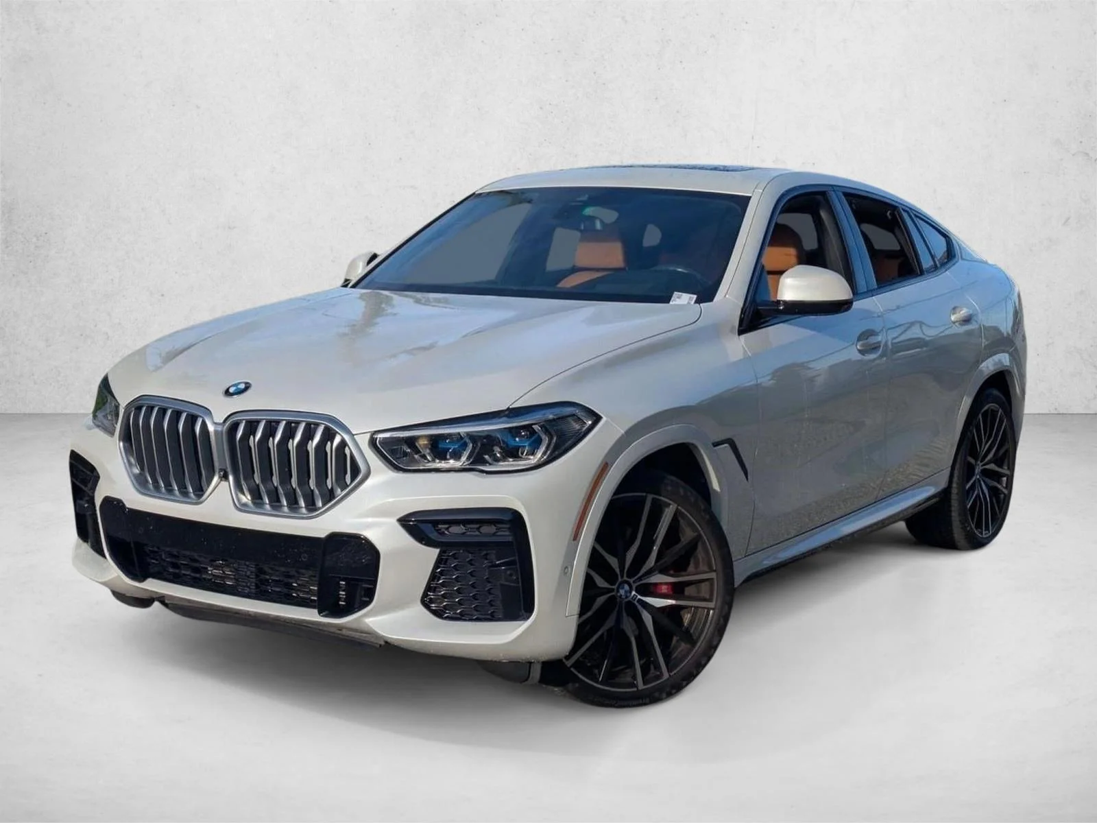 Used 2022 Mineral White Metallic BMW xDrive40i image 1