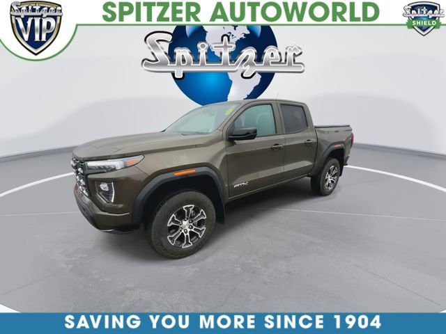Used 2025 Deep Bronze Metallic GMC AT4 image 4