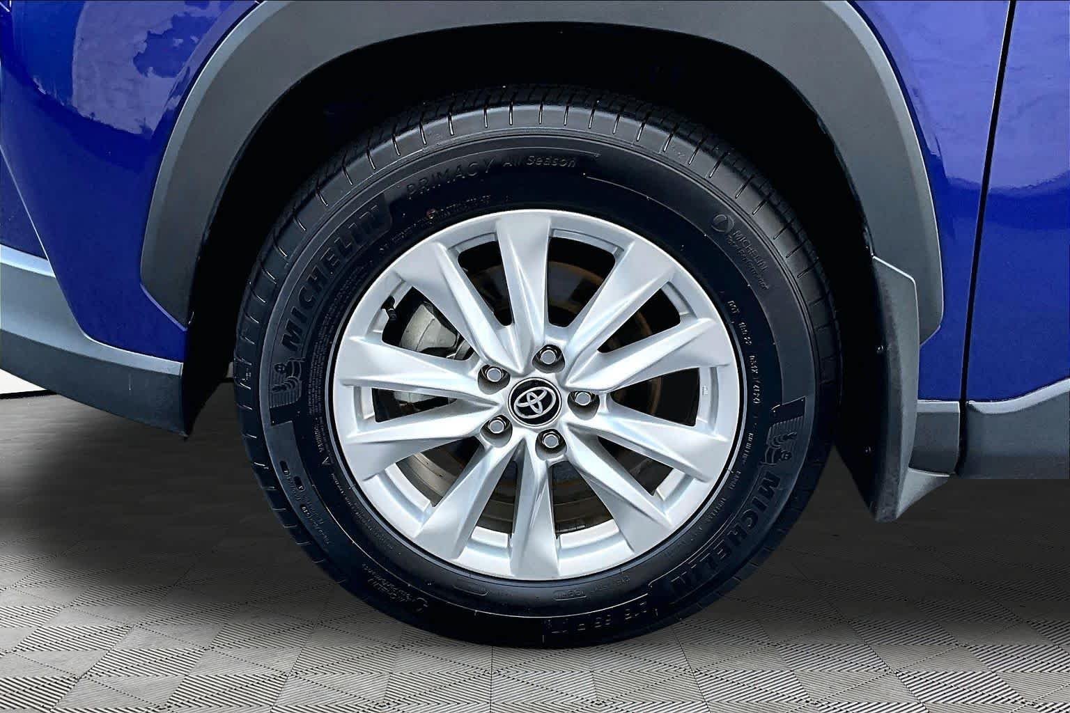 Used 2025 Blue Crush Metallic Toyota LE image 11