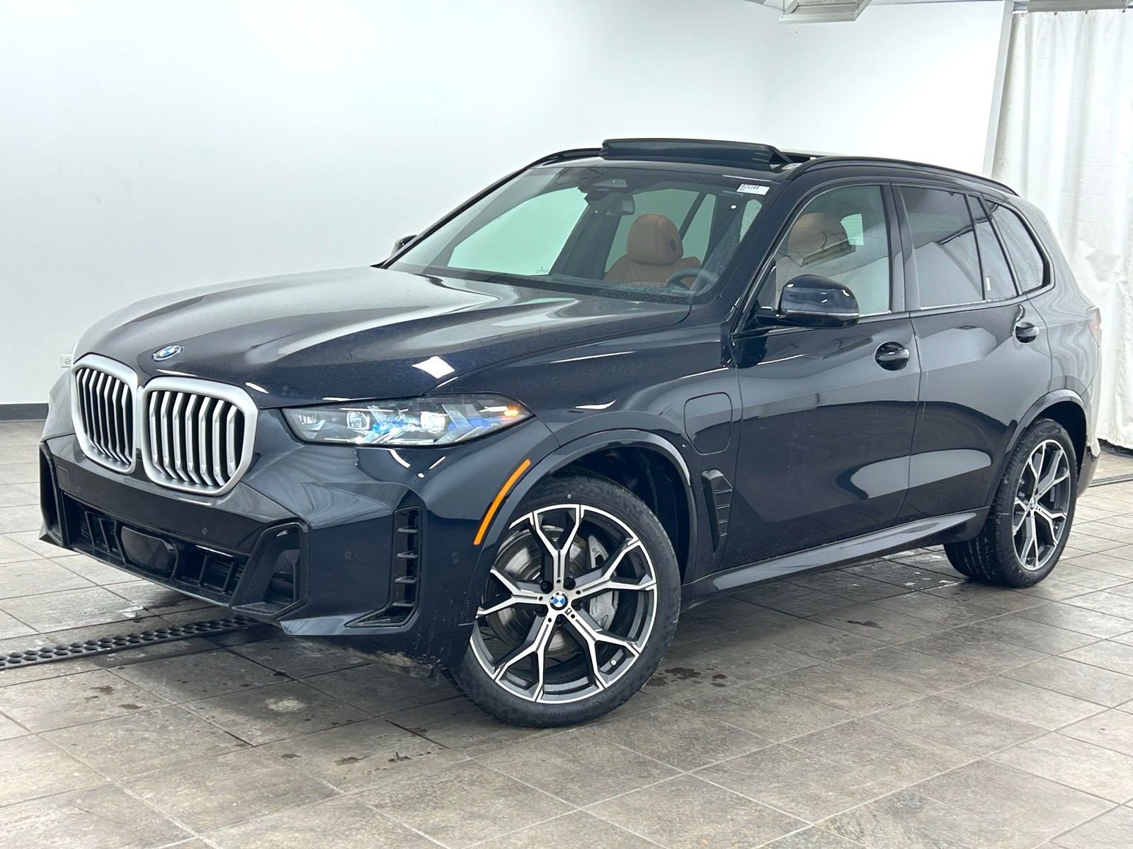 New 2026 Carbon Black Metallic BMW xDrive50e image 1