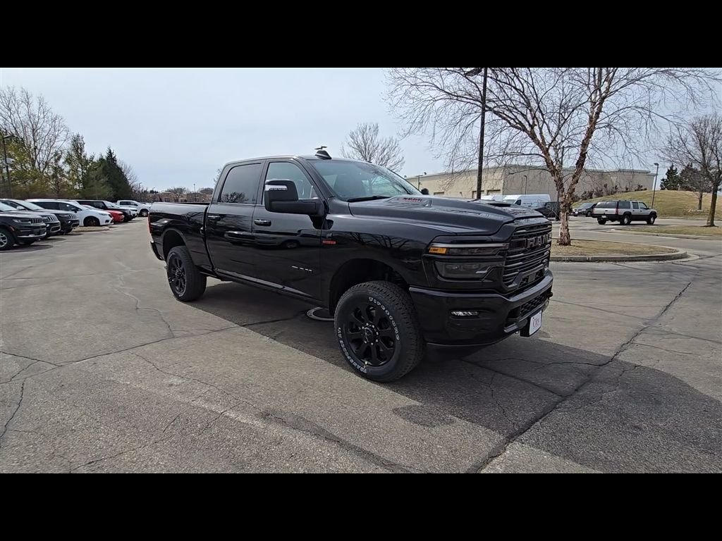 New 2026 Diamond Black Crystal Pearl-Coat Exterior Paint RAM Laramie image 2