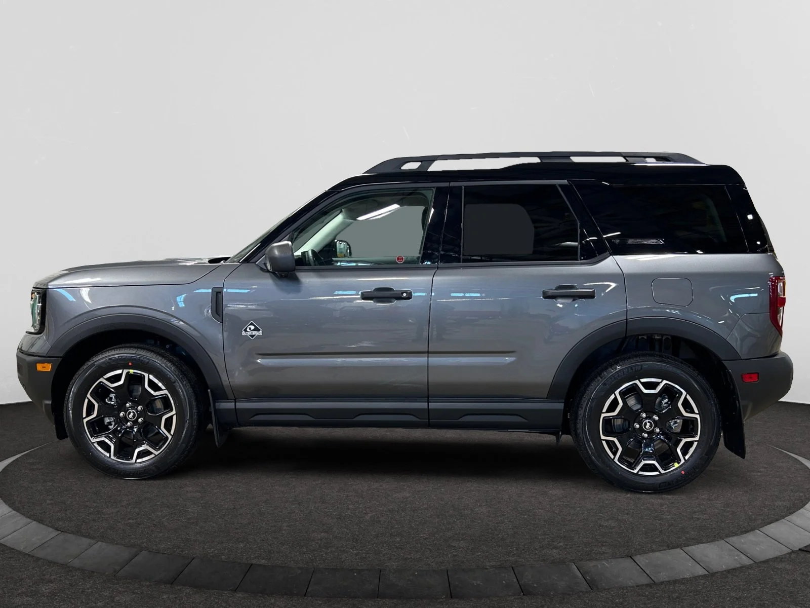 New 2026 Carbonized Grey Metallic Ford Outer Banks image 2