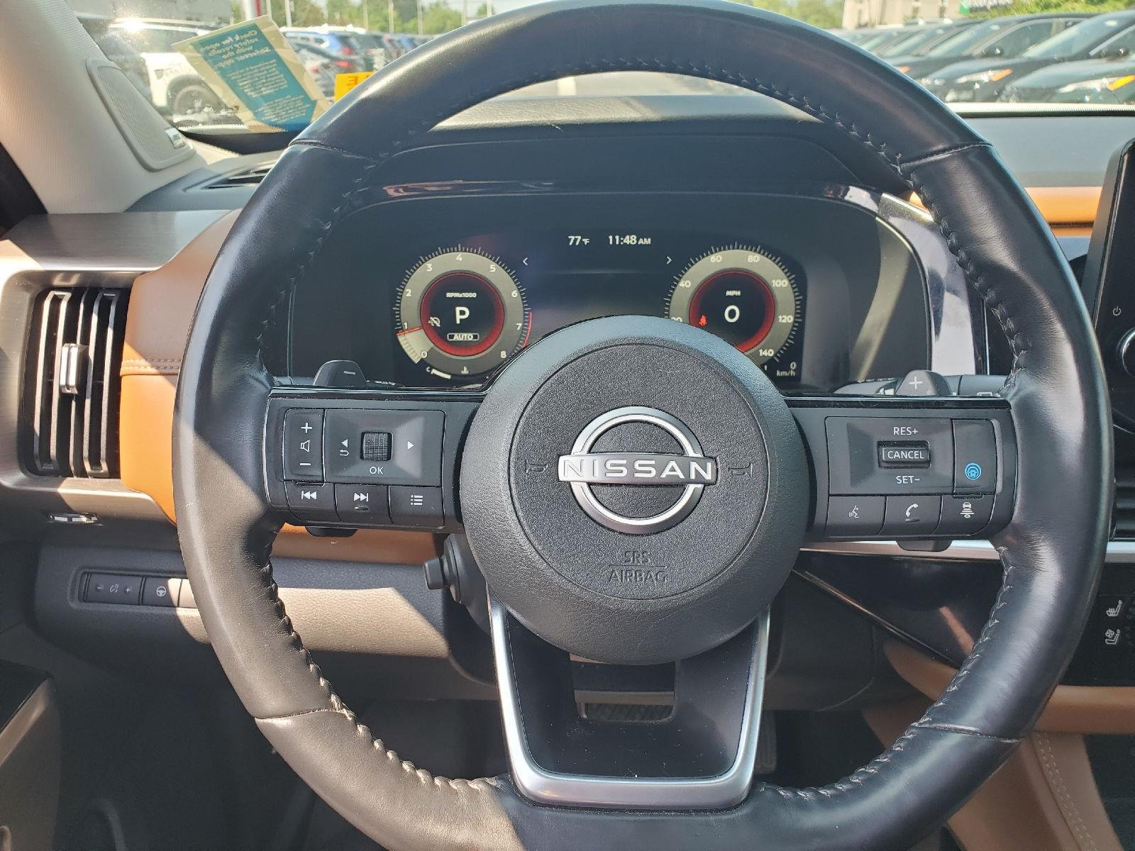 Used 2022 Pearl White Tricoat/Super Black Nissan Platinum image 12