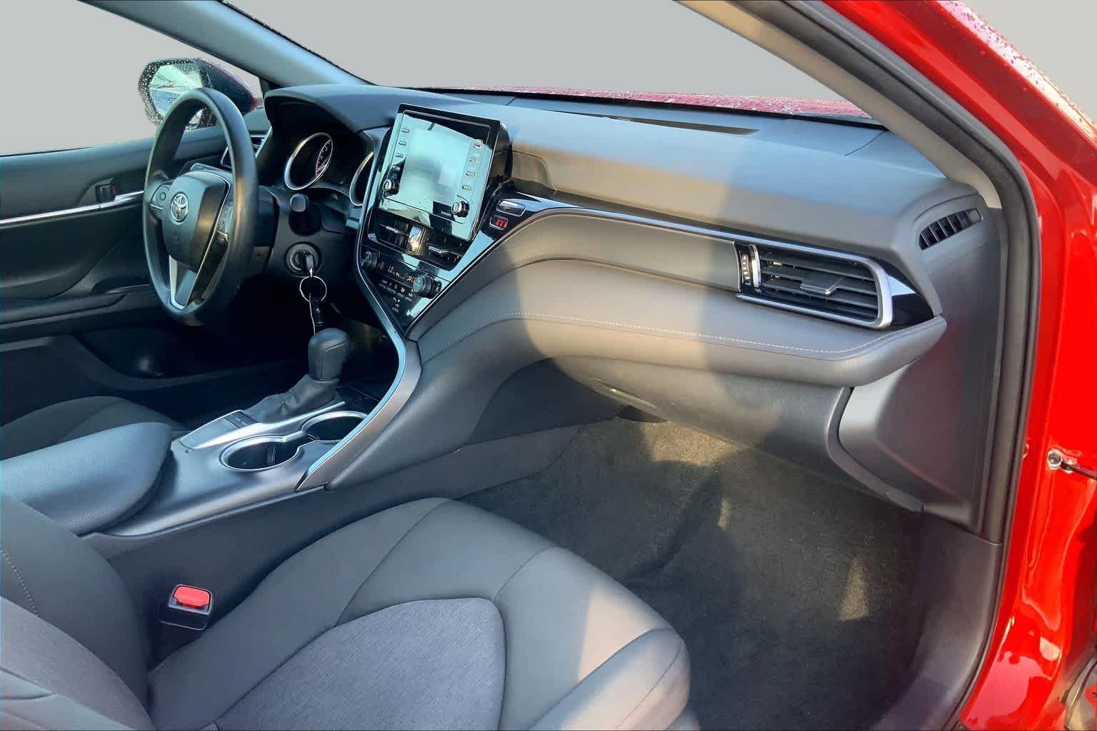 Used 2024 Supersonic Red Toyota LE image 17
