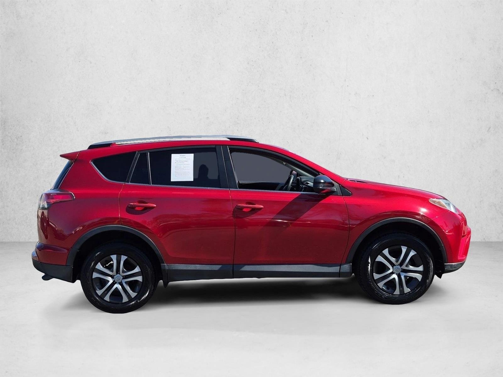 Used 2017 Barcelona Red Metallic Toyota LE image 4